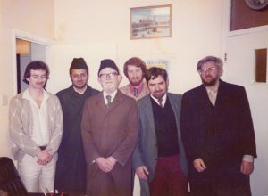 (1983) Muzzafar Clarke, second from the right, accompanies other British converts in welcoming Maulana Ataul Rashid, the Imam of the London Mosque.